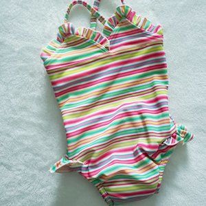 I play. Baby Swimsuit with reusable swim diaper.